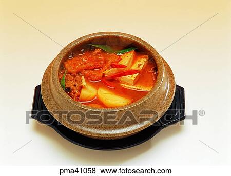 Stock Photo - kimchi soup, kimchi soup, soup with bean curd, indoor, cook, cooking. Fotosearch