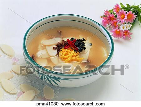 Stock Image - rice-cake soup, New Year, indoor, cook, cooking, food. Fotosearch