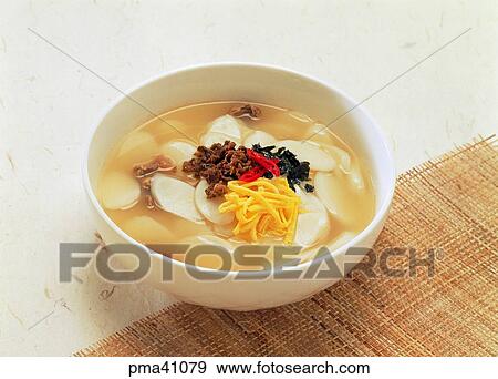Stock Photo - rice-cake soup, New Year, indoor, cook, cooking, food. Fotosearch