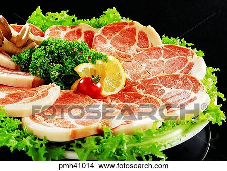 Picture - meat dish, freezing meat, pork, Korean style bacon, Samgyupsal, indoor. Fotosearch
