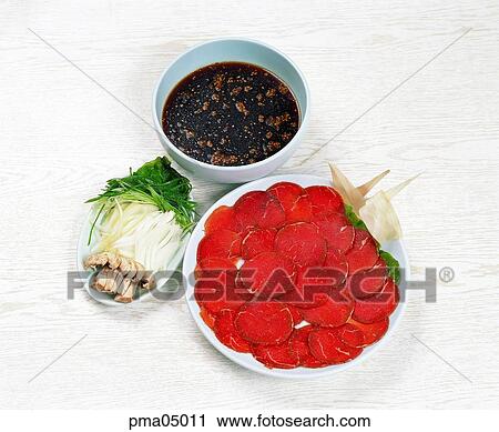 Stock Image - meat, meat dish, pork, fresh meat, shabushabu, soup with sliced meat and vegetables. Fotosearch