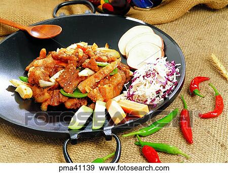 Stock Photo - meat, meat dish, red pepper, pork, indoor, vegetables. Fotosearch