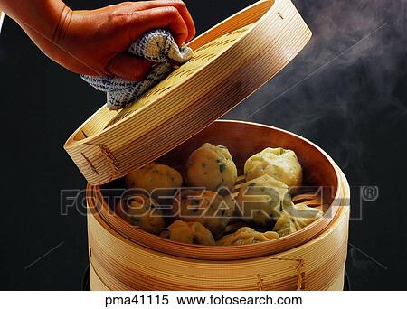 Stock Photography - dumpling, powdered food, flour-based food, hand, hands, person, people. Fotosearch