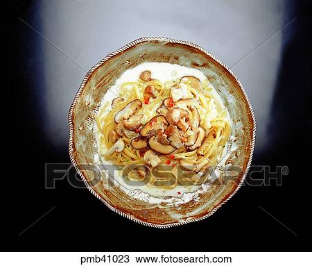 Stock Image - noodles, mushroom spaghetti, powdered food, flour-based food, objects, things. Fotosearch
