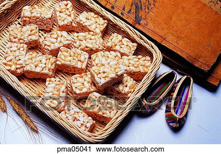 Stock Image - glutinous rice cracker frizzled in oil, gangjung, tea and cakes, desert, objects, things. Fotosearch