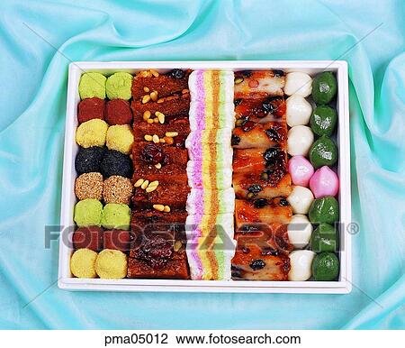 Stock Image - tea and cakes, rice cake, objects, things, articles, indoor. Fotosearch