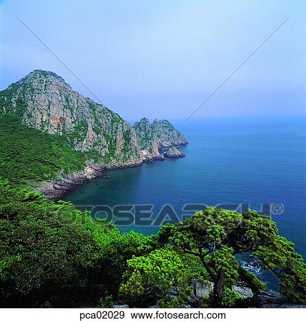 coastal cliff, cliff, rocky island, rock, cliff, seashore, coast View Large Photo Image Stock Photo - coastal cliff, cliff, rocky island, rock, cliff, seashore, coast. Fotosearch