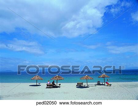 Stock Image - parasol, beach parasol, summer, sea, sand, sandy beach, vacance. Fotosearch