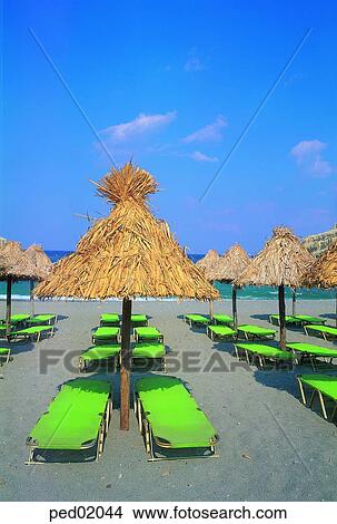 parasol, beach parasol, suntan chair, rest facilities, rest area, rest, relaxation View Large Photo Image Picture - parasol, beach parasol, suntan chair, rest facilities, rest area, rest, relaxation. Fotosearch