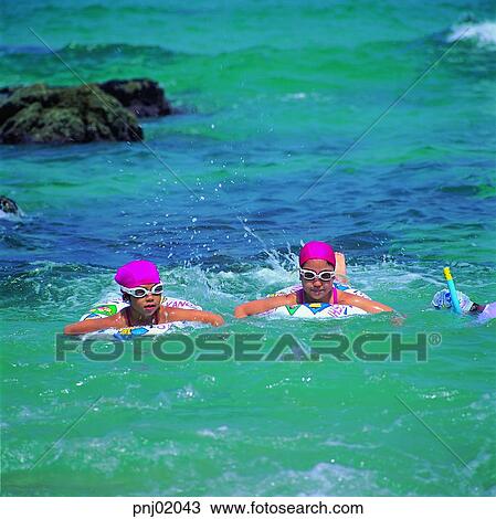 Stock Image - rippling, dabbling, sunbarh, sunbathing, summer, summer, rest. Fotosearch
