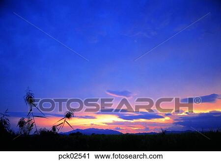 Stock Image - red sky, sunrise, sunset, cloud, sky, sunset, sundown. Fotosearch