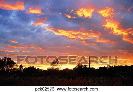 Stock Image - red sky, sunrise, sunset, cloud, sky, sunset, sundown. Fotosearch
