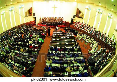 Stock Image - church, worship, sacred song, hymn, light, illumination, Cross. Fotosearch