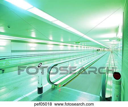 escalator in an airport, escalator, airport, building facilities, building establishments, interior, public facilities View Large Photo Image Stock Photo - escalator in an airport, escalator, airport, building facilities, building establishments, interior, public facilities. Fotosearch