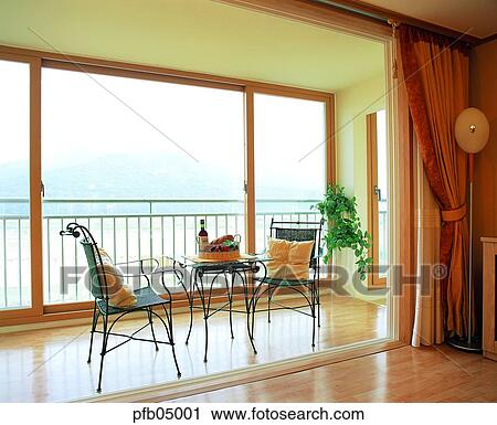 veranda, veranda, apartment house, table, chair, bench, sofa View Large Photo Image Stock Image - veranda, veranda, apartment house, table, chair, bench, sofa. Fotosearch