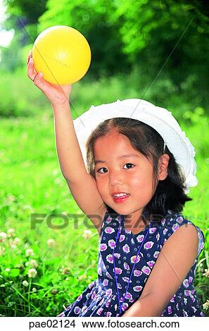 ball game, ball, children, child, kid, girl, girl View Large Photo Image Picture - ball game, ball, children, child, kid, girl, girl. Fotosearch