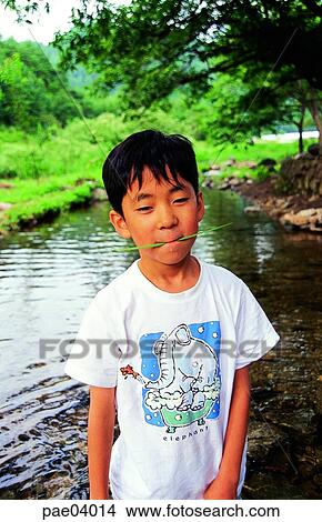 Picture - children, child, kid, nature, summer, brook, rivulet. Fotosearch