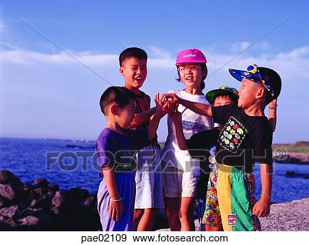 children, child, kid, several people, some people, sea, person View Large Photo Image Stock Photo - children, child, kid, several people, some people, sea, person. Fotosearch