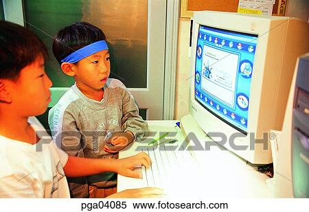 Stock Photography - computer, children, child, kid, brother, two people, monitor. Fotosearch