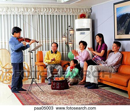 family, musical instrument performing, large family, three generations, old couple, harmony, happy View Large Photo Image Stock Image - family, musical instrument performing, large family, three generations, old couple, harmony, happy. Fotosearch