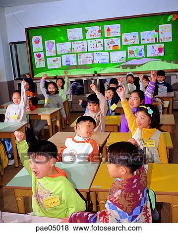 presentation, asking, question, raising a hand, classroom, elementary school, elementary education View Large Photo Image Stock Photo - presentation, asking, question, raising a hand, classroom, elementary school, elementary education. Fotosearch