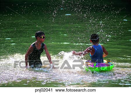 rippling, dabbling, rippling, dabbling, spray, summer, boy View Large Photo Image Stock Image - rippling, dabbling, rippling, dabbling, spray, summer, boy. Fotosearch