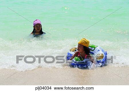 rippling, dabbling, wave, tube, sea, sea, girl View Large Photo Image Picture - rippling, dabbling, wave, tube, sea, sea, girl. Fotosearch