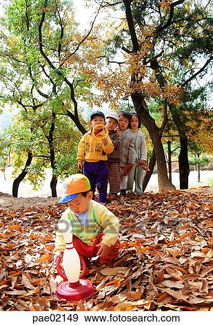 throwing a ring, autumn, fall, children, child, kid, order View Large Photo Image Stock Photo - throwing a ring, autumn, fall, children, child, kid, order. Fotosearch