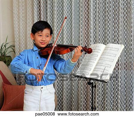 violin, musical instrument performing, musical instrument, performing, musical note, string instrument, boy View Large Photo Image Stock Photo - violin, musical instrument performing, musical instrument, performing, musical note, string instrument, boy. Fotosearch