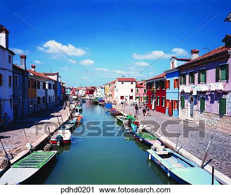 Stock Image - Italy, Italy, waterway, village, town, residence, house. Fotosearch