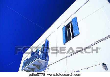 Mikonos, white house, blue window, white building, construction, housing, house interior View Large Photo Image Stock Photo - Mikonos, white house, blue window, white building, construction, housing, house interior. Fotosearch