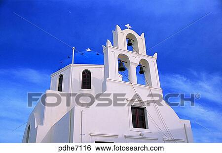 Stock Photograph - Santorini, church, Cross, cross, white house, blue roof, building. Fotosearch