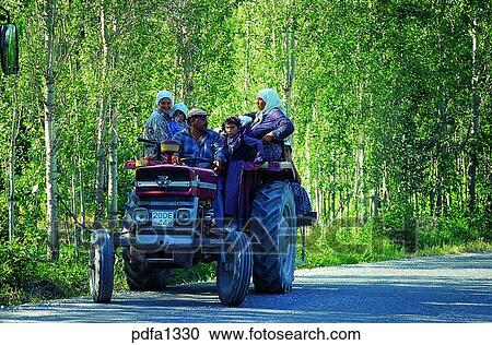 Stock Image - Colosse, tractor, farm, farmer, inhabitants, residents, dwellers. Fotosearch