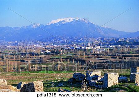 Stock Photo - LAODICEA, Laodicea, mountainous country, ruins, perpetual snow, mountain, city. Fotosearch