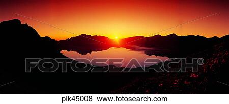 Stock Photo - red sky, sunset, sunrise, Mt Baekdu, Mt Baekdu crater lake, mountain. Fotosearch