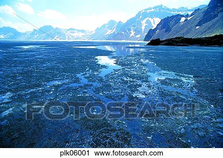 Stock Image - winter mountain, cloud, day, snow, water, Mt Baekdu, North Korea. Fotosearch
