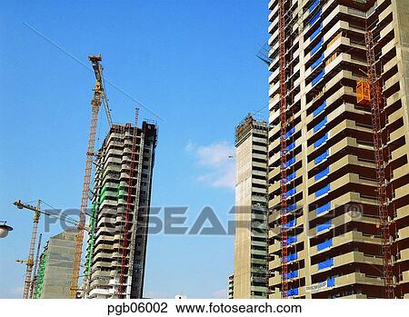 construction, construction, construction work, construction site, construction, building, high-rise apartment building View Large Photo Image Stock Image - construction, construction, construction work, construction site, construction, building, high-rise apartment building. Fotosearch