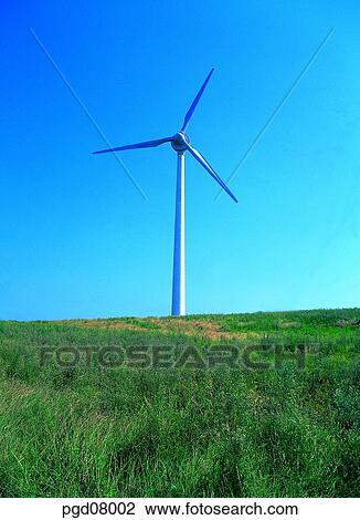 Stock Image - day, field, weather vane, weathercock, power plant, industry. Fotosearch