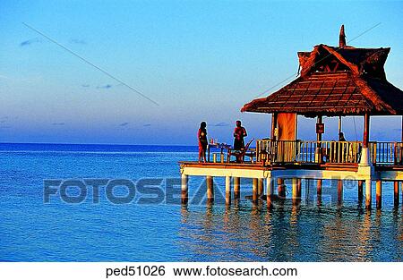 building, construction, travel place, destination, setting sun, sunset, man and woman View Large Photo Image Stock Photograph - building, construction, travel place, destination, setting sun, sunset, man and woman. Fotosearch