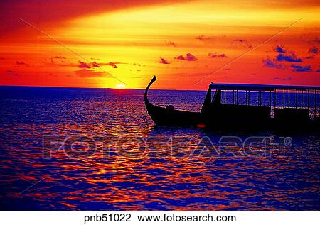 setting sun, sunset, red sky, sunset, sunrise, Maldives, sea View Large Photo Image Stock Image - setting sun, sunset, red sky, sunset, sunrise, Maldives, sea. Fotosearch