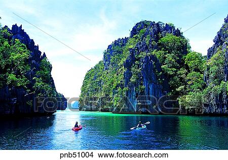 travel place, destination, day, two people, Lagen resort, sea, rock View Large Photo Image Picture - travel place, destination, day, two people, Lagen resort, sea, rock. Fotosearch