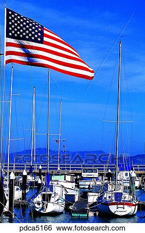 Stock Photograph - national flag, day, America, USA, American national flag, Stars and Stripes, ship. Fotosearch