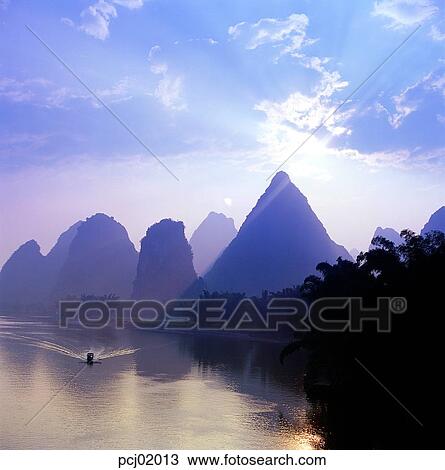 Stock Image - cloud, river, Guilin's landscape, Guilin's scenery, Guilin, red sky, 0576. Fotosearch