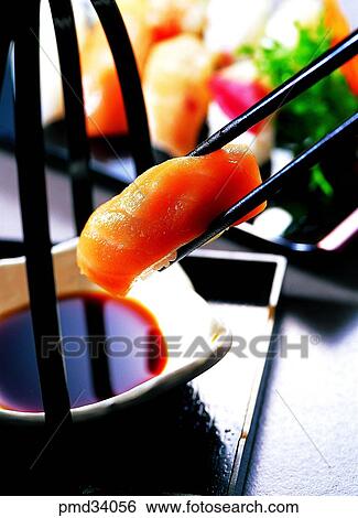 Stock Photograph - saysauce, soy, raw fish, sushi, dish, food. Fotosearch