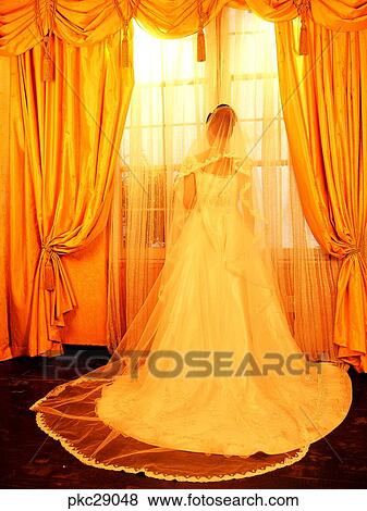 Stock Photo - curtain, Oriental, back, behind, dress, wedding veil, bridal veil. Fotosearch
