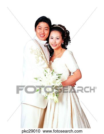 Stock Image - marriage, man and woman, men and women, male and female, two people, two guys, dress. Fotosearch