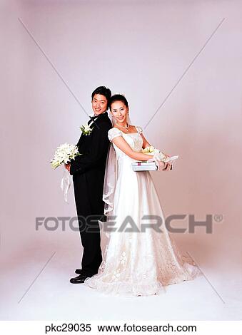 Stock Photography - marriage, man and woman, men and women, male and female, Oriental, two people, two guys. Fotosearch