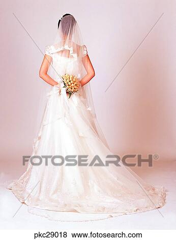 marriage, Oriental, back, behind, wedding veil, bridal veil, bouquet View Large Photo Image Stock Photo - marriage, Oriental, back, behind, wedding veil, bridal veil, bouquet. Fotosearch