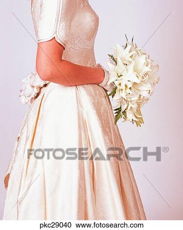 Stock Image - marriage, Oriental, dress, bouquet, person, human. Fotosearch