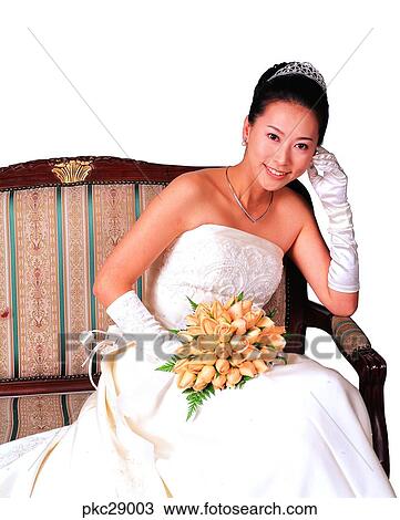 marriage, Oriental, dress, model, smile, bouquet, person View Large Photo Image Stock Image - marriage, Oriental, dress, model, smile, bouquet, person. Fotosearch